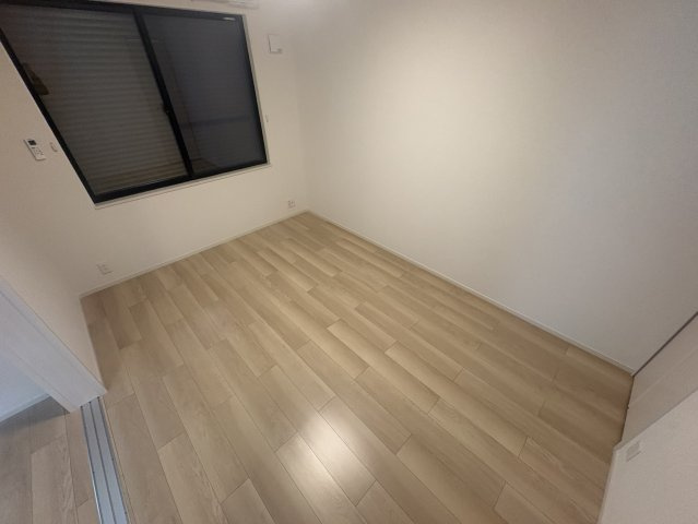 プラム江坂の洋室