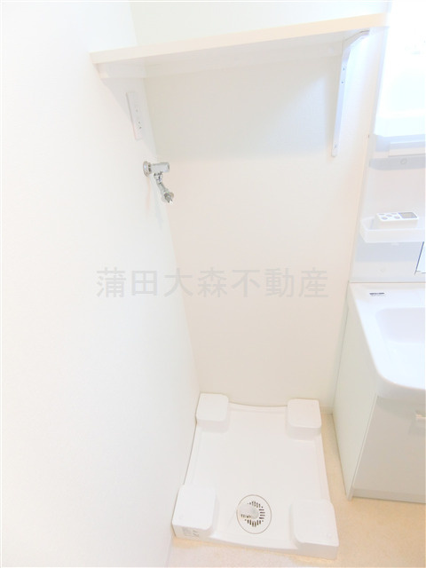スパシエ蒲田グランドタワーの設備|室内洗濯機置場