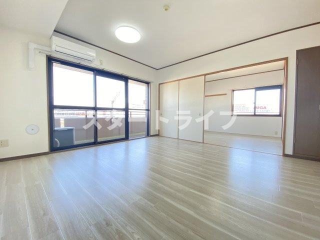 大阪市淀川区野中北１丁目の賃貸マンションの居間・リビング