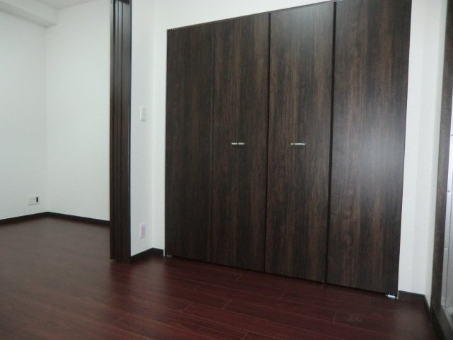 大阪市淀川区十三東４丁目の賃貸マンションの寝室
