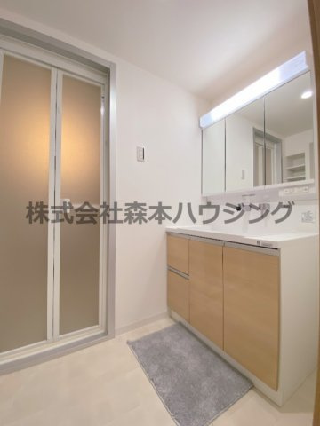 【洗面所】 | 　日興交野スカイマンション | ゆったりとスペースのある洗面所