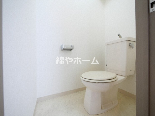 シャトル新深江のトイレ|落ち着いた色調のトイレです