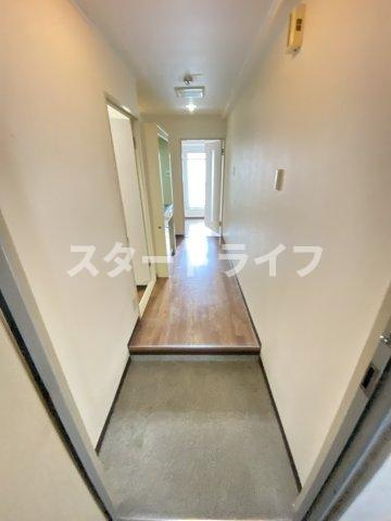 大阪市淀川区新高１丁目の賃貸マンションの玄関