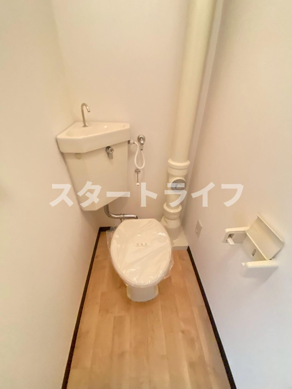 大阪市淀川区木川西１丁目の賃貸マンションのトイレ