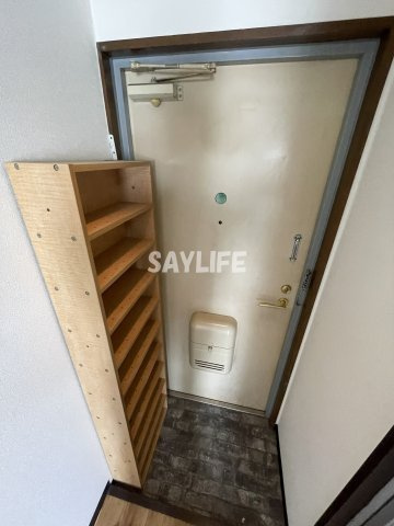 コンフォート緑橋の玄関