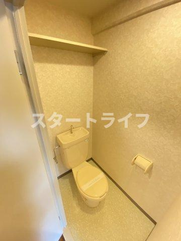 大阪市淀川区西三国１丁目の賃貸マンションのトイレ