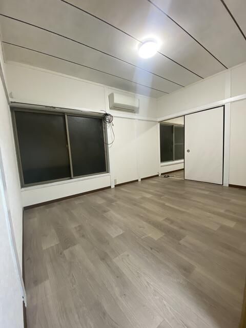 三角町戸建ての寝室