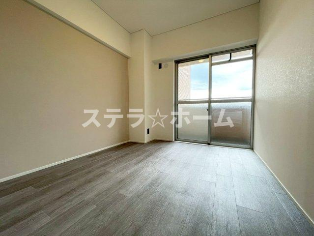 セントラル朝日が丘の洋室|落ち着いた色調の洋室です