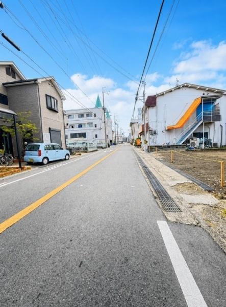 枚方市 甲斐田町　建築条件付き 土地の前面道路含む現地写真