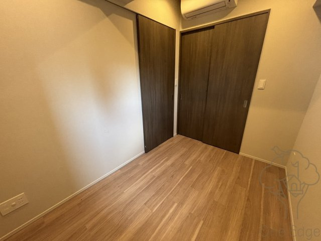 シーズンフラッツ中崎の寝室
