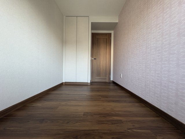 グランドメゾン新梅田タワー THE CLUB RESIDENCEの洋室