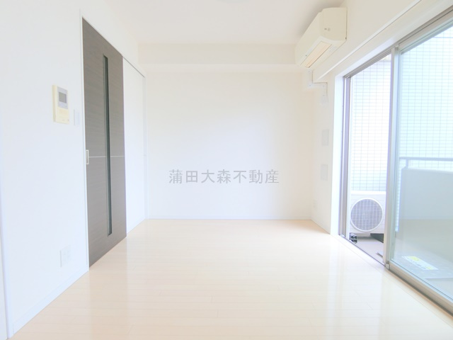 六郷土手分譲賃貸マンションの居間・リビング