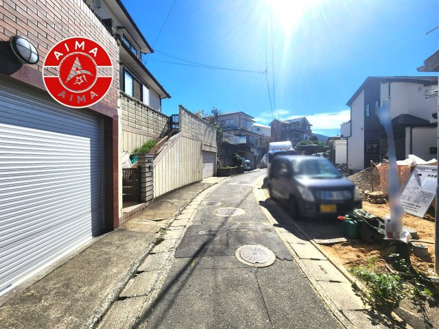 福岡市西区拾六町3丁目第1-2棟（A号棟）の外観|前面道路含む現地の写真です。