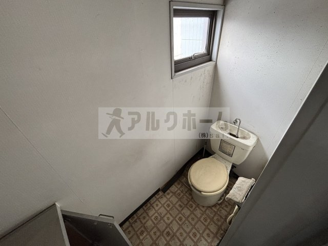 柏原市清州１丁目の店舗一部のトイレ