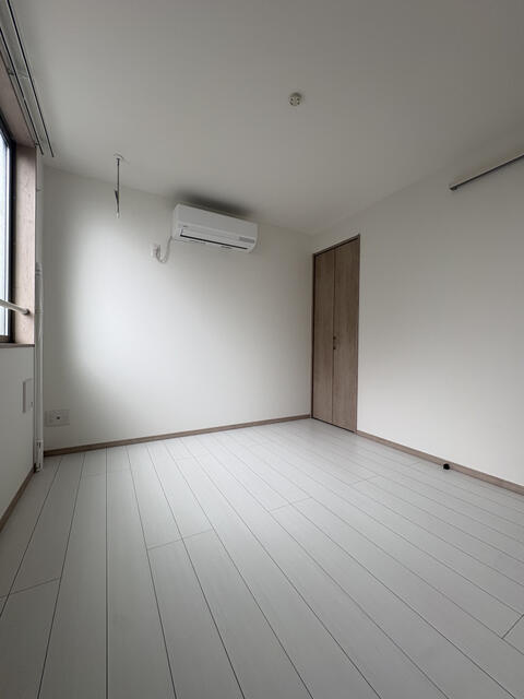 川崎市多摩区菅１丁目のアパートの居間・リビング