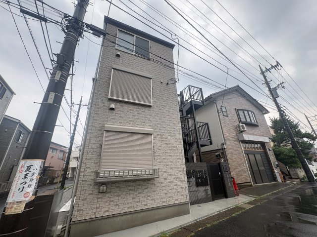 川崎市多摩区菅１丁目のアパートの外観