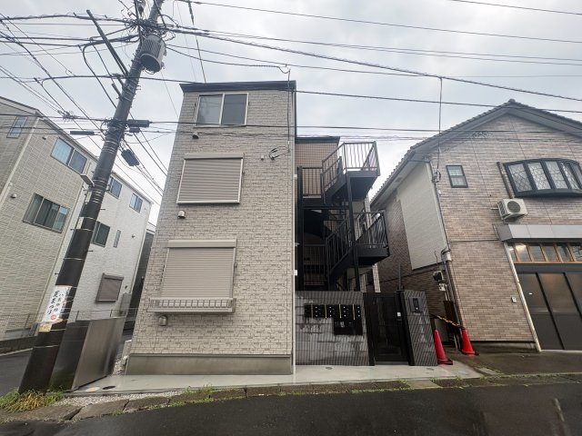 川崎市多摩区菅１丁目のアパートの外観