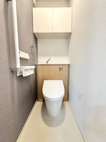 アンジュ　ド　ボヌール　香里園のトイレ|落ち着いた色調のトイレです