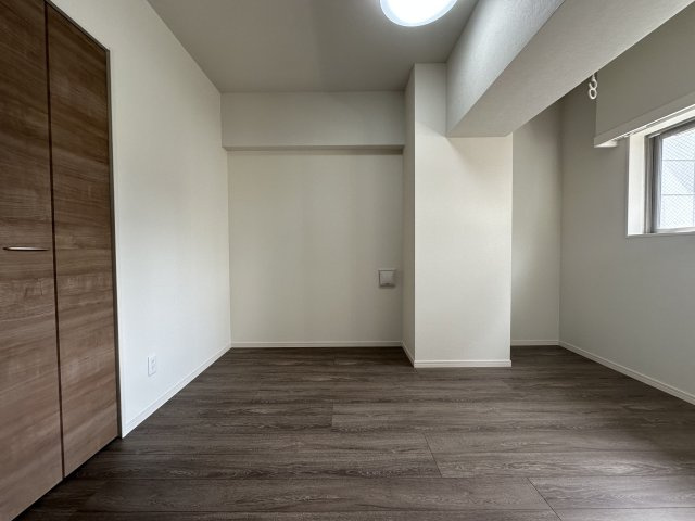 アルファコート町屋の寝室