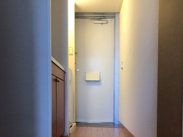 レオパレスＯＳＡＷＡの玄関