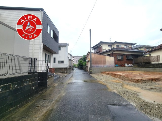 福岡市早良区飯倉8丁目第1-1棟（1号棟）の外観|前面道路含む現地の写真です。