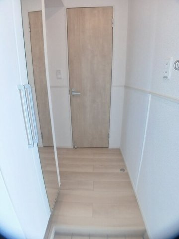 ビリーブ　Ｄの玄関