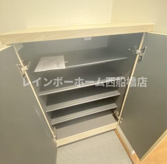 MELDIA京成大和田Ⅱの玄関