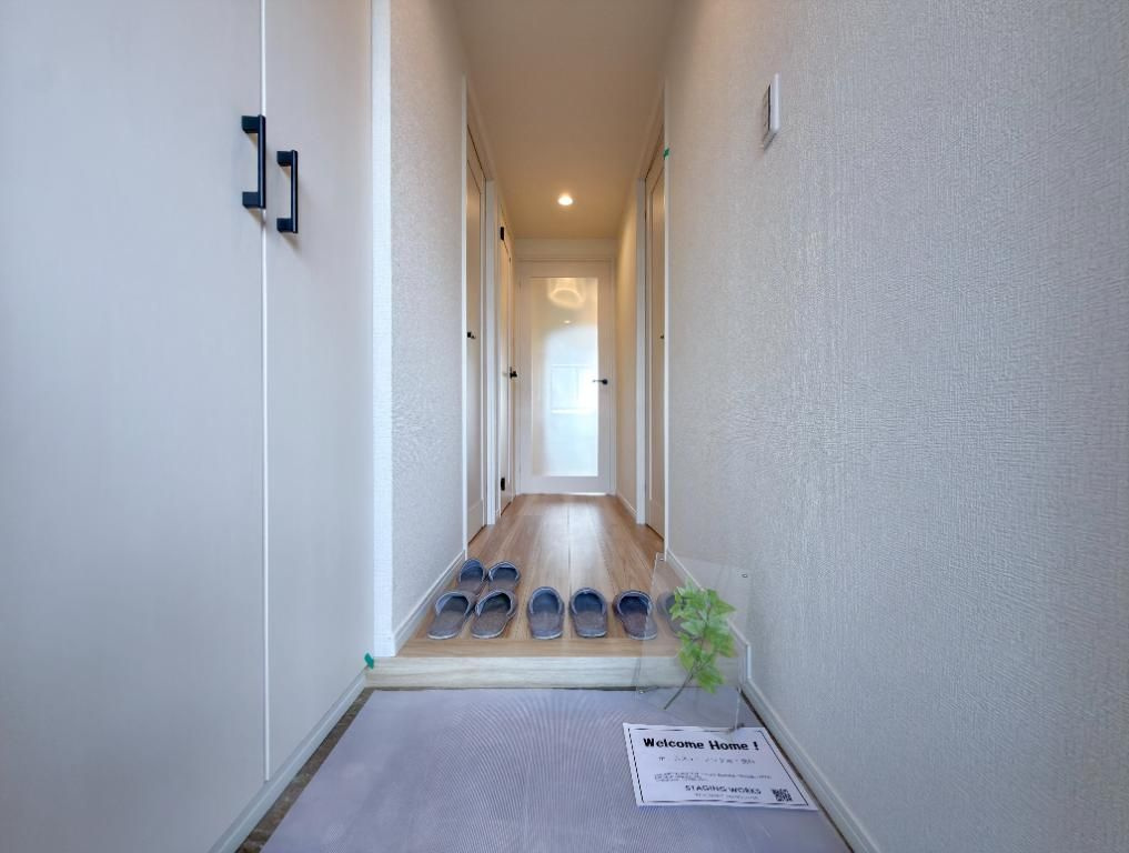 昭島市郷地町３丁目の中古マンションの玄関