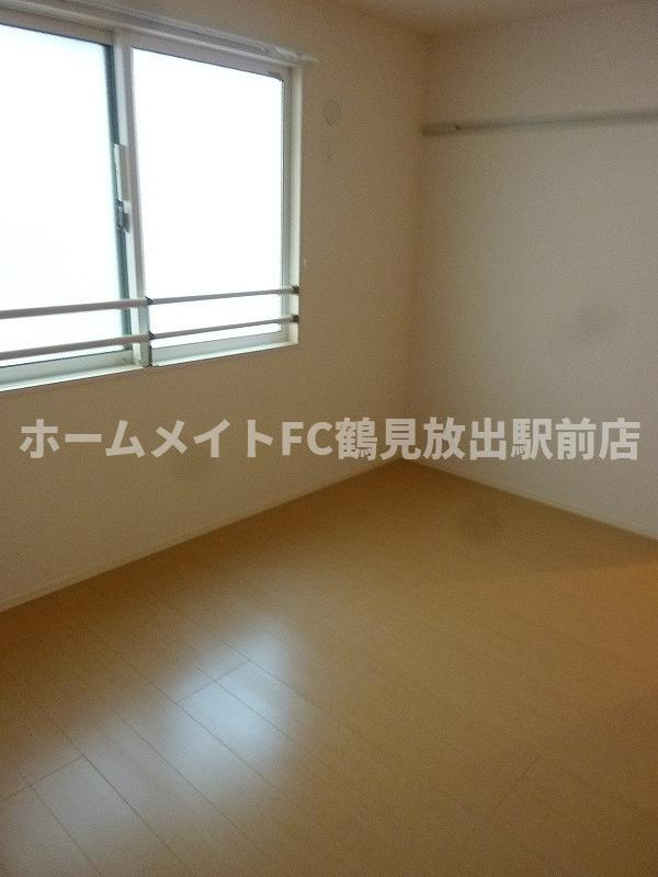 大阪市鶴見区茨田大宮４丁目のハイツの洋室
