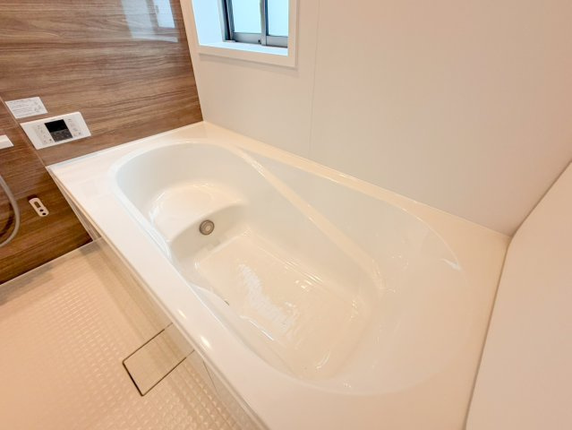 宜野湾市野嵩新築戸建て1号棟のトイレ|階段下に1階トイレございます。