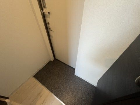 ジーメゾン南大塚の玄関