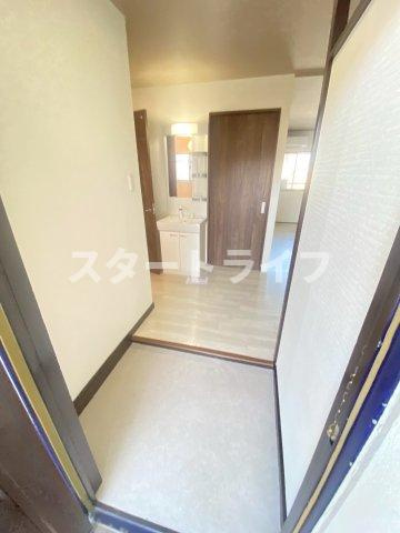 大阪市淀川区加島３丁目の賃貸マンションの玄関