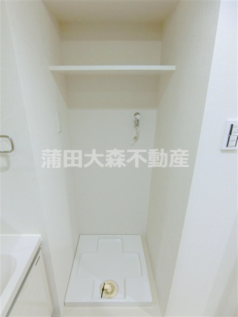 ステージファースト糀谷の設備|棚付き室内洗濯機置き場