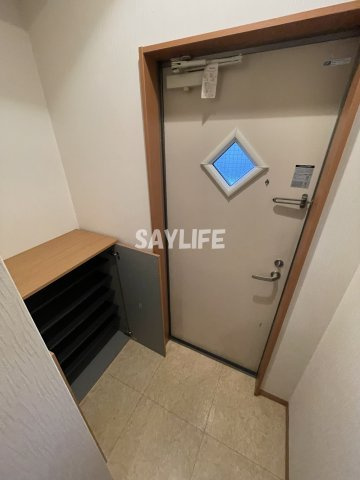 リビエールハナテンの玄関