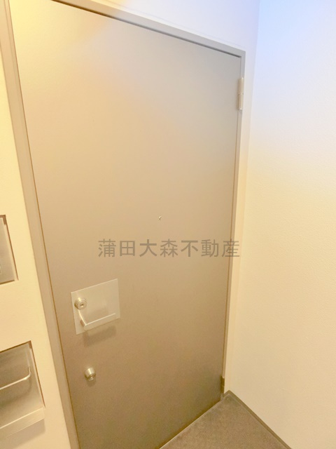 クレッセント萩中の玄関