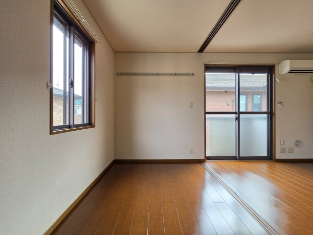 稲城市矢野口のアパートの寝室