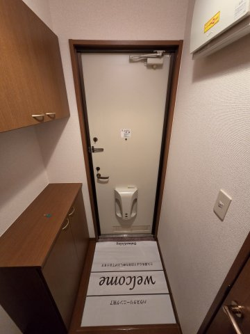 稲城市矢野口のアパートの玄関