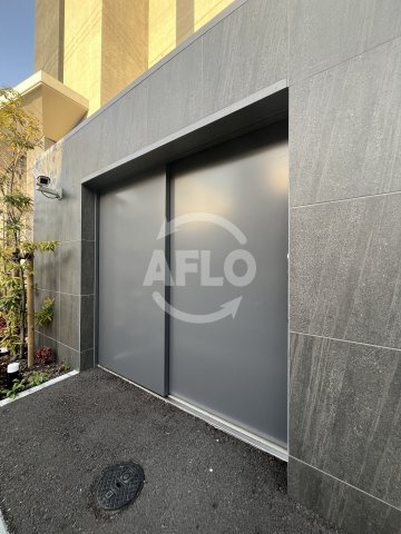 ラフィネール大阪十三の外観パース|ゴミ置き場