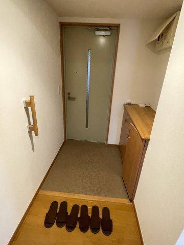 川崎市多摩区布田の賃貸マンションの玄関
