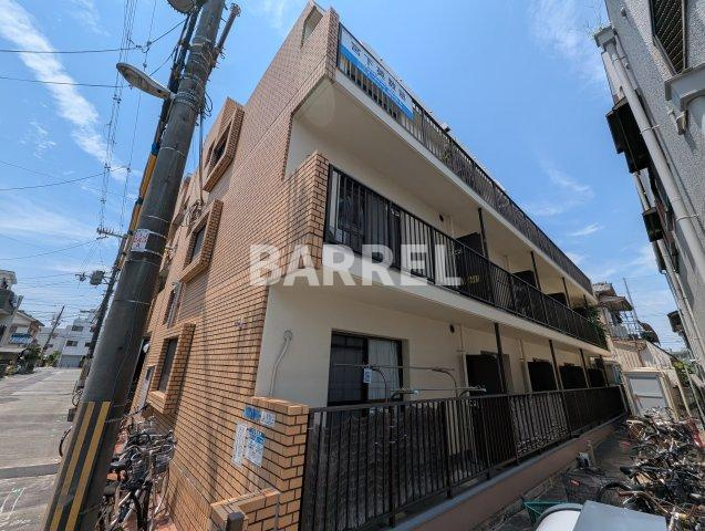 ロイヤルハイツ豊里A棟の外観