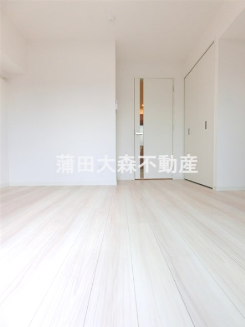 REALIZEレアライズ蒲田Ⅲの居間・リビング