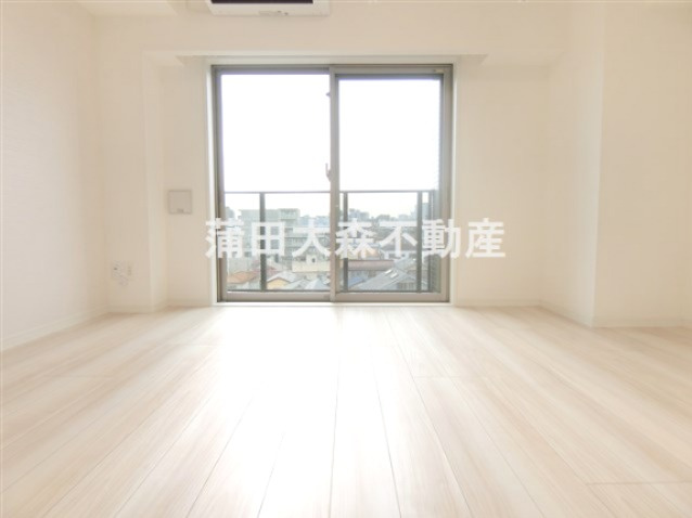 REALIZEレアライズ蒲田Ⅲの居間・リビング|洋室7.6帖