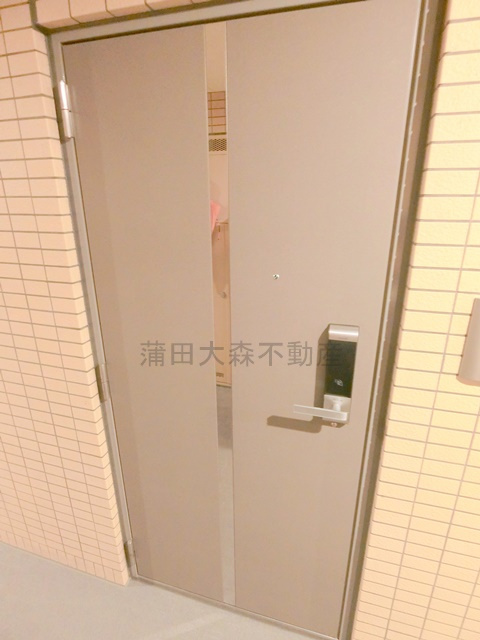 KDXレジデンス雪谷大塚の玄関