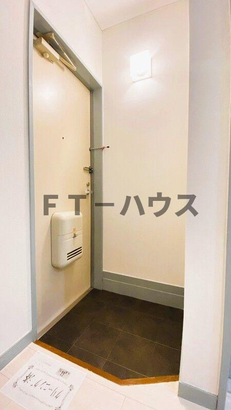 エスペランサ黒砂の玄関
