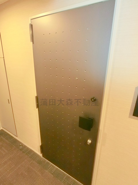 ヴォーガコルテ蒲田南の玄関