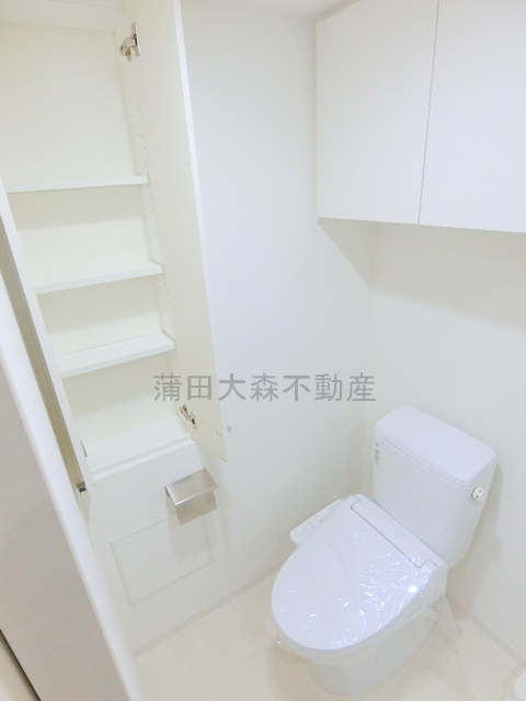 ヴォーガコルテ蒲田南のトイレ|棚収納と温水洗浄便座付きトイレ