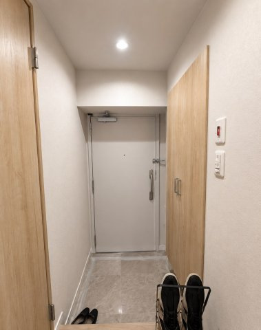 労住まきのハイツ一号棟の玄関