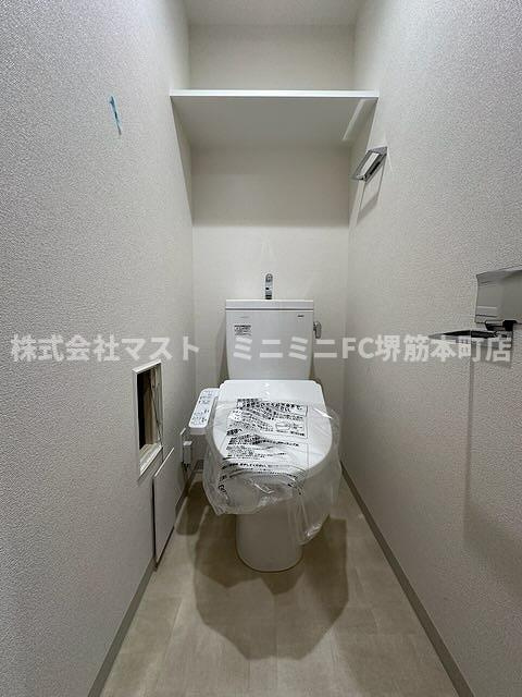 大阪市中央区博労町１丁目の賃貸マンションのトイレ