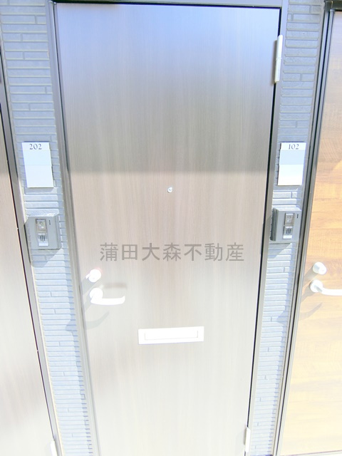 プライムガーデン池上WESTの玄関