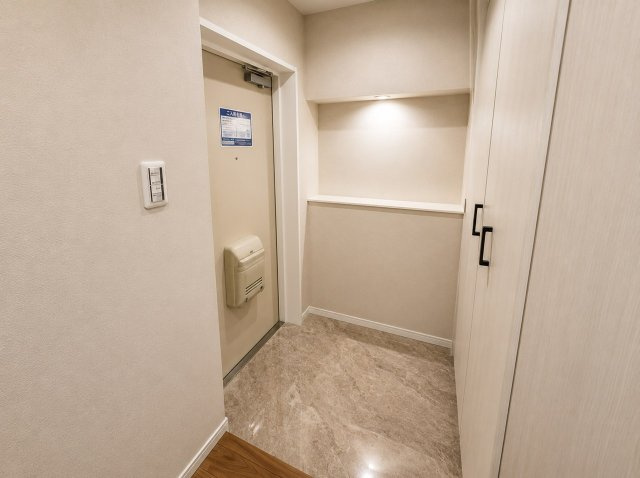 東急ドエル枚方山田池ビレジの玄関